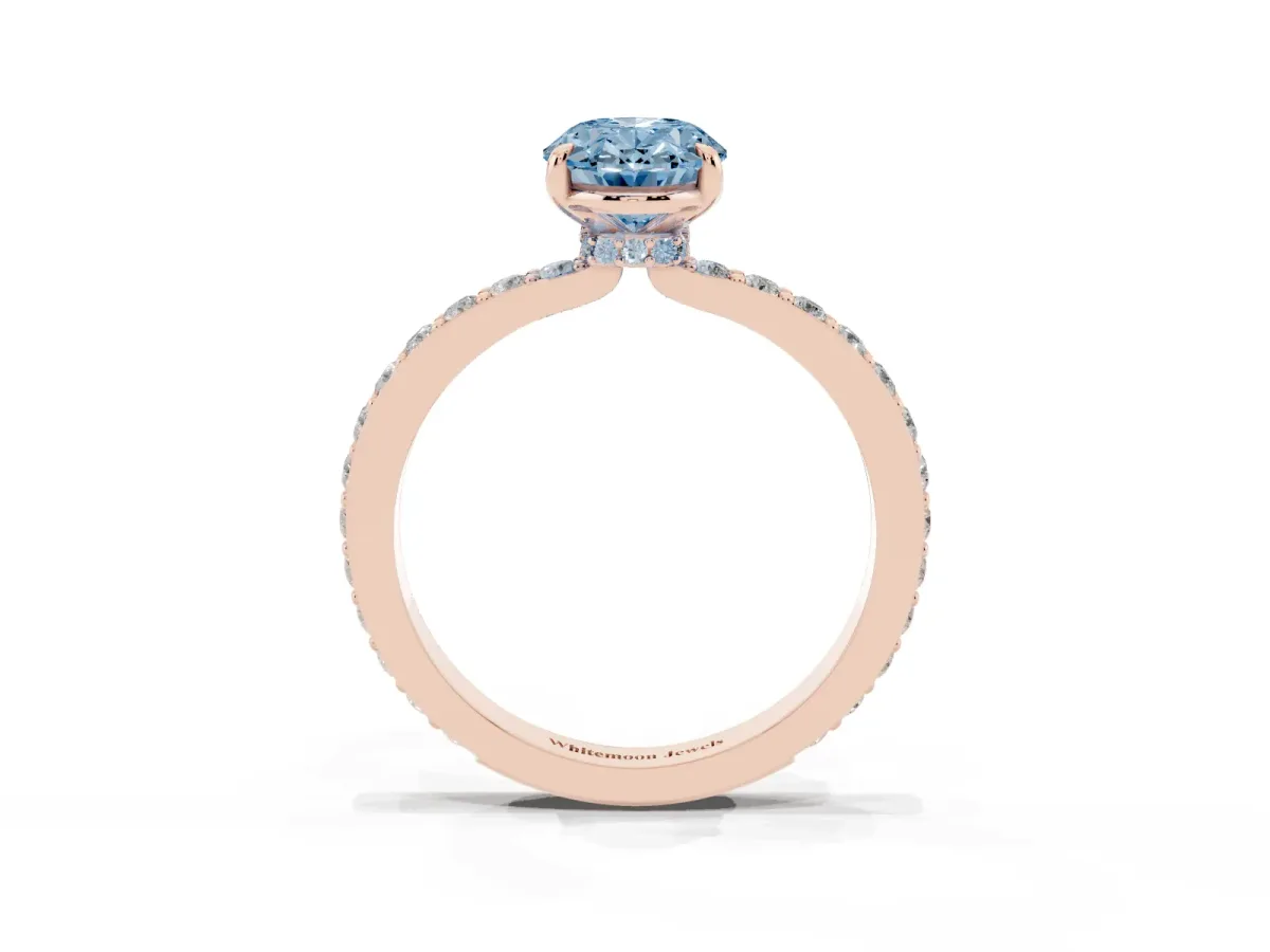 Fancy Blue Oval Cut Diamond Pavé Engagement Ring with Round Accents and Prong Setting Rose gold