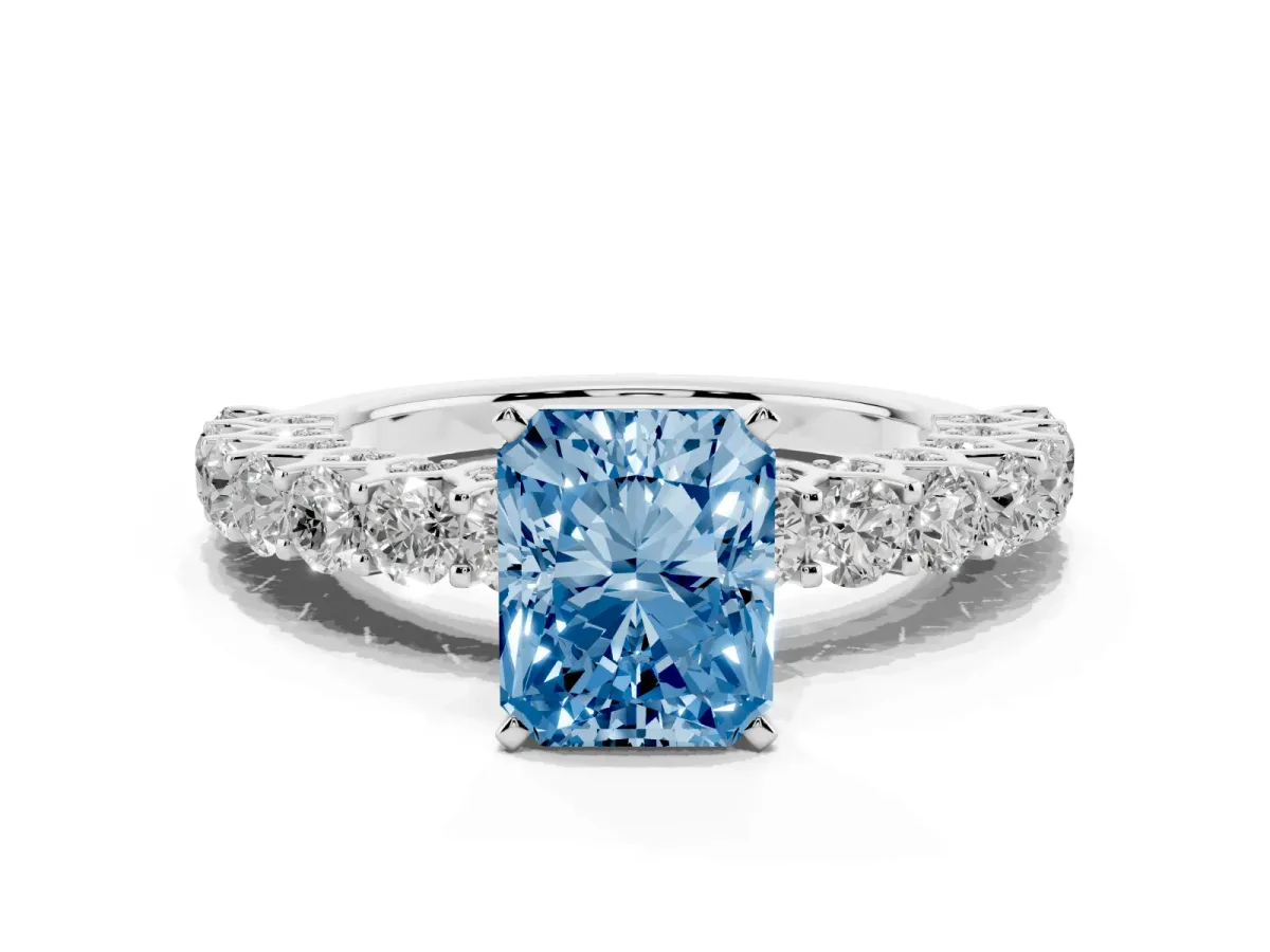 Fancy Blue Radiant Cut Diamond Solitaire Ring with Shared Prong Pavé Band and Four-Prong Setting Silver