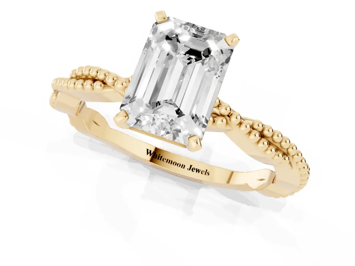 Emerald Cut Solitaire Twisted Band with Bead Prong Setting Yellow gold