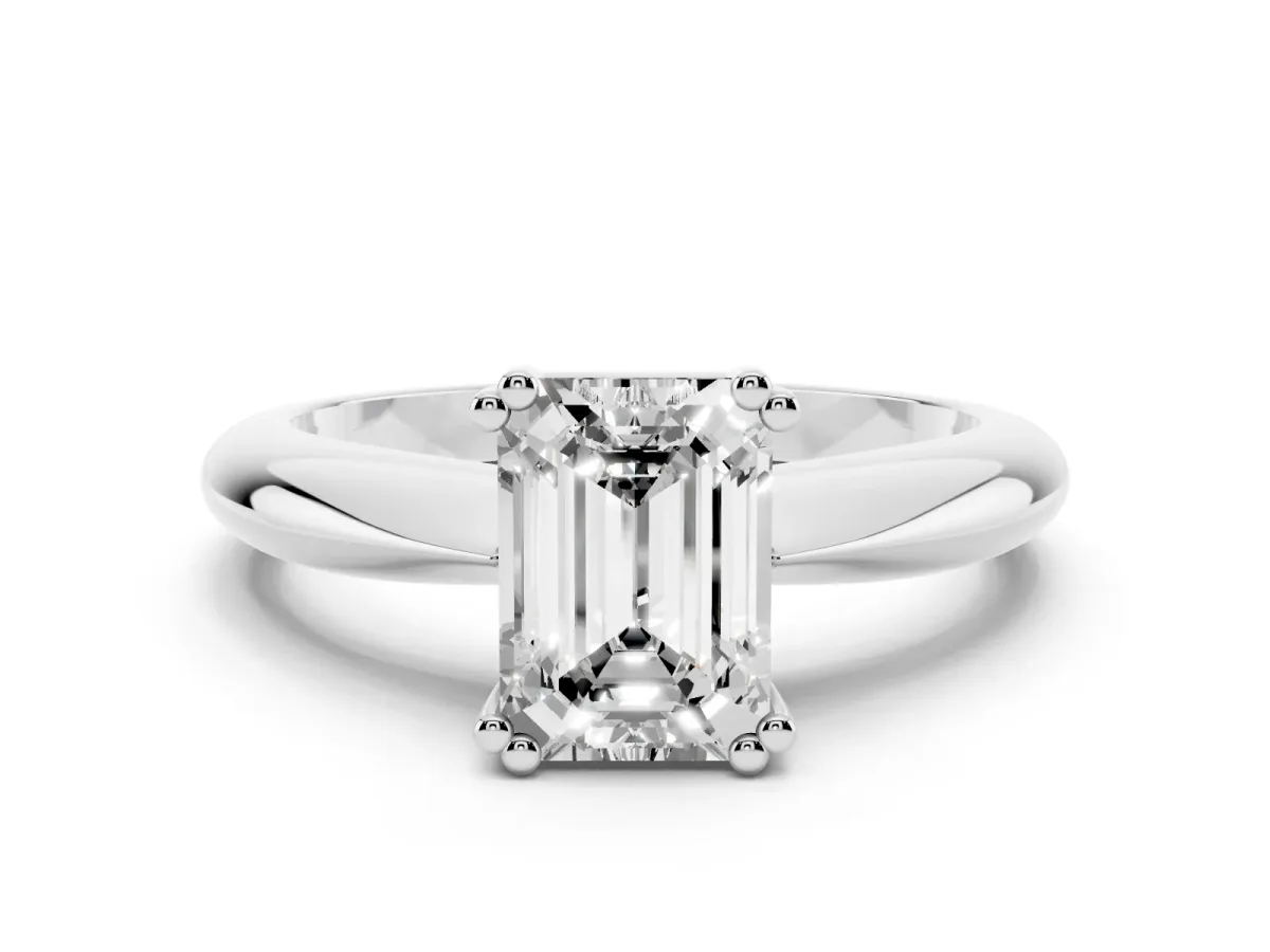 Emerald Cut Cut Solitaire Engagement Ring with Tapered Band and Four-Prong Setting Silver
