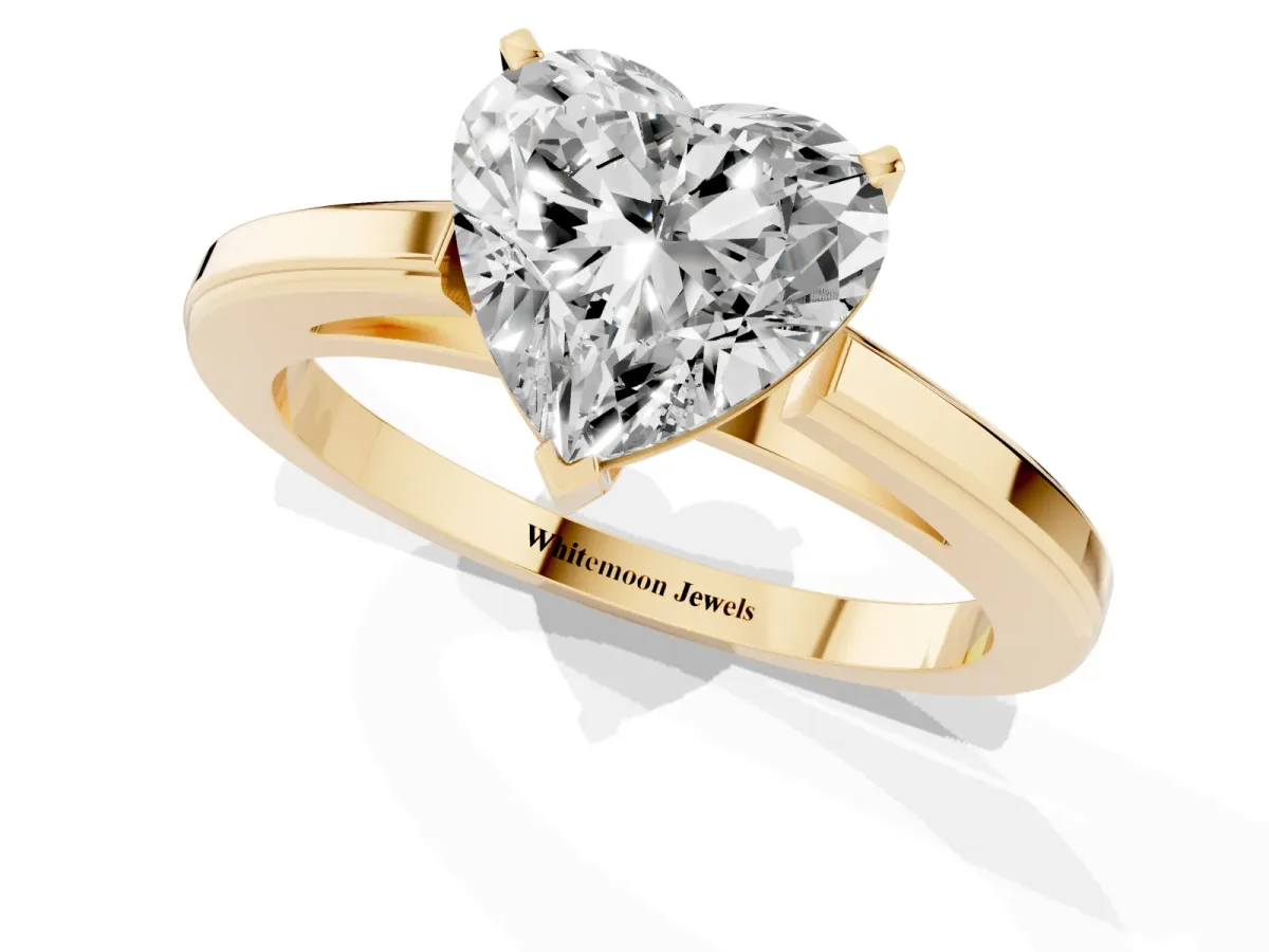 Heart Cut Solitaire Diamond Ring with Four-Prong Setting and Classic Band Yellow gold