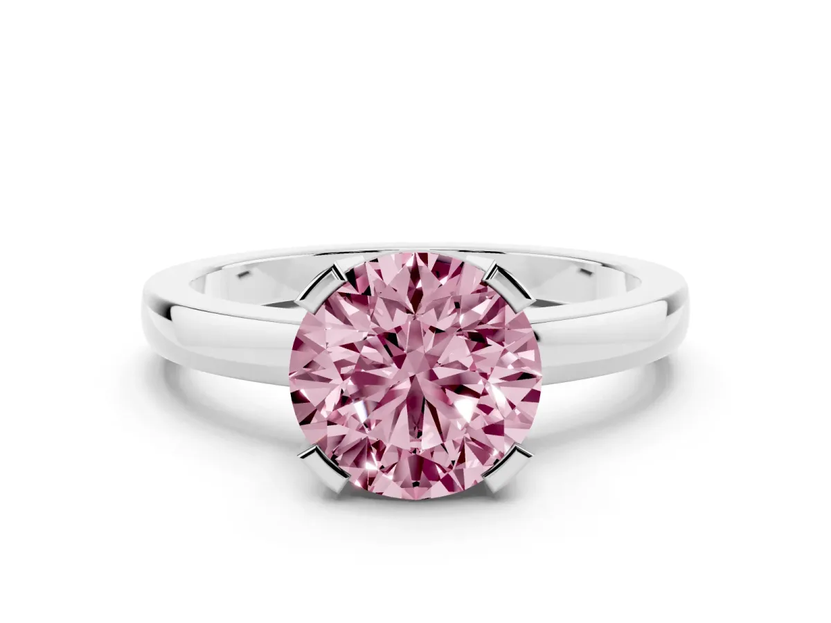 Fancy Pink Round Cut Cut Solitaire Ring with Four-Prong Setting and Classic Band Silver
