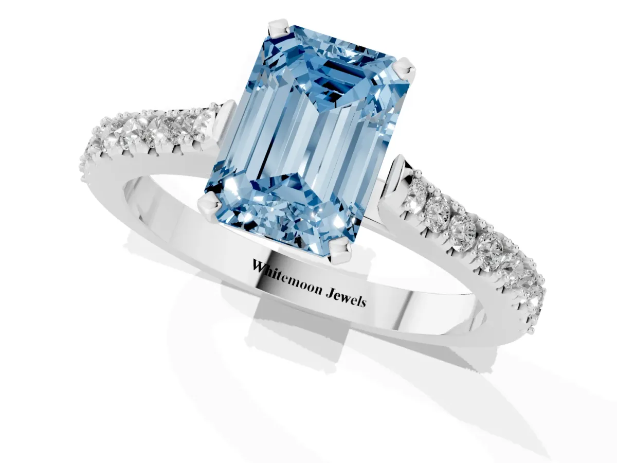 Fancy Blue Emerald Cut Cut Solitaire Diamond Engagement Ring with Pave Band and Four-Prong Setting Silver