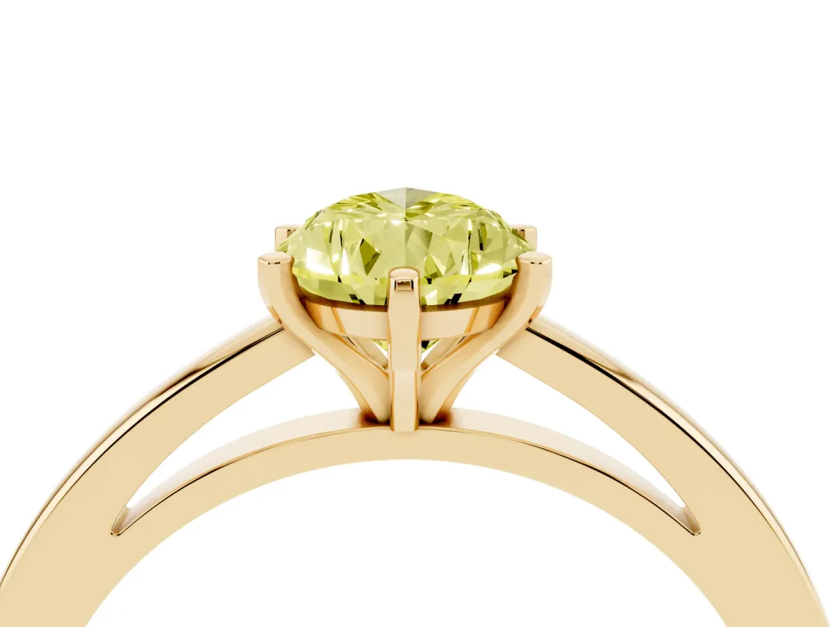 Fancy Yellow Pear Cut Solitaire Diamond Engagement Ring with Four-Prong Setting on a Classic Band Yellow gold