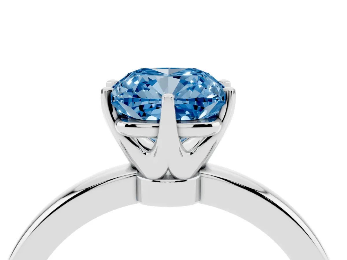 Fancy Blue Cushion Cut Solitaire Diamond Ring with Six-Prong Setting on a Classic Band Platinum