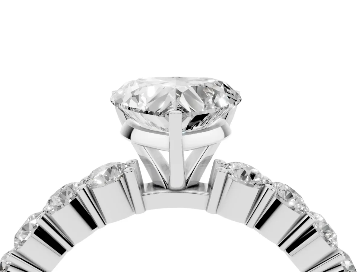 Heart Cut Diamond Solitaire Ring with Shared Prong Round Side Stones Silver