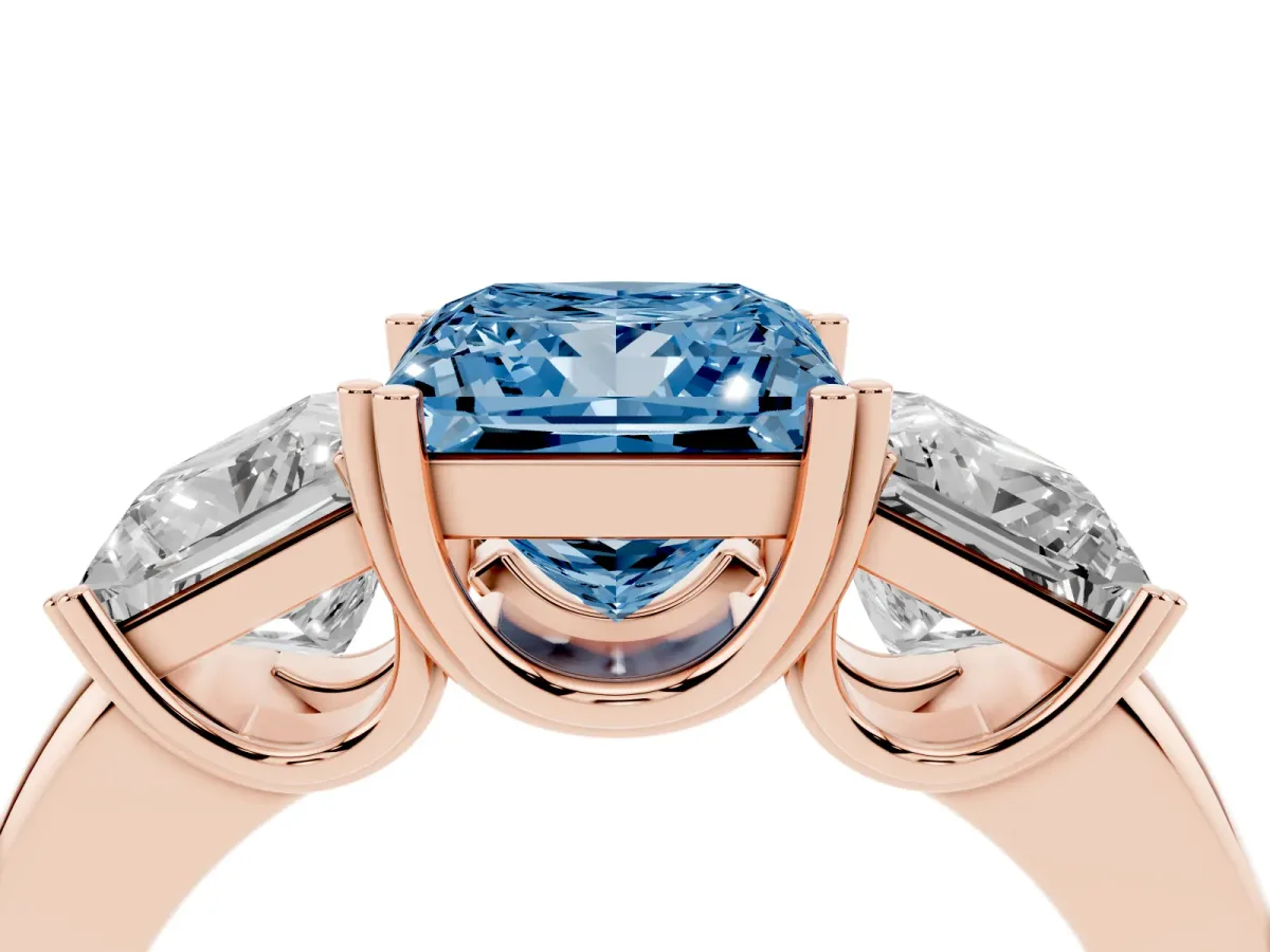 Fancy Blue Three-Stone Princess Cut Cut Diamond Ring with Channel Set Band and Four-Prong Setting Rose gold