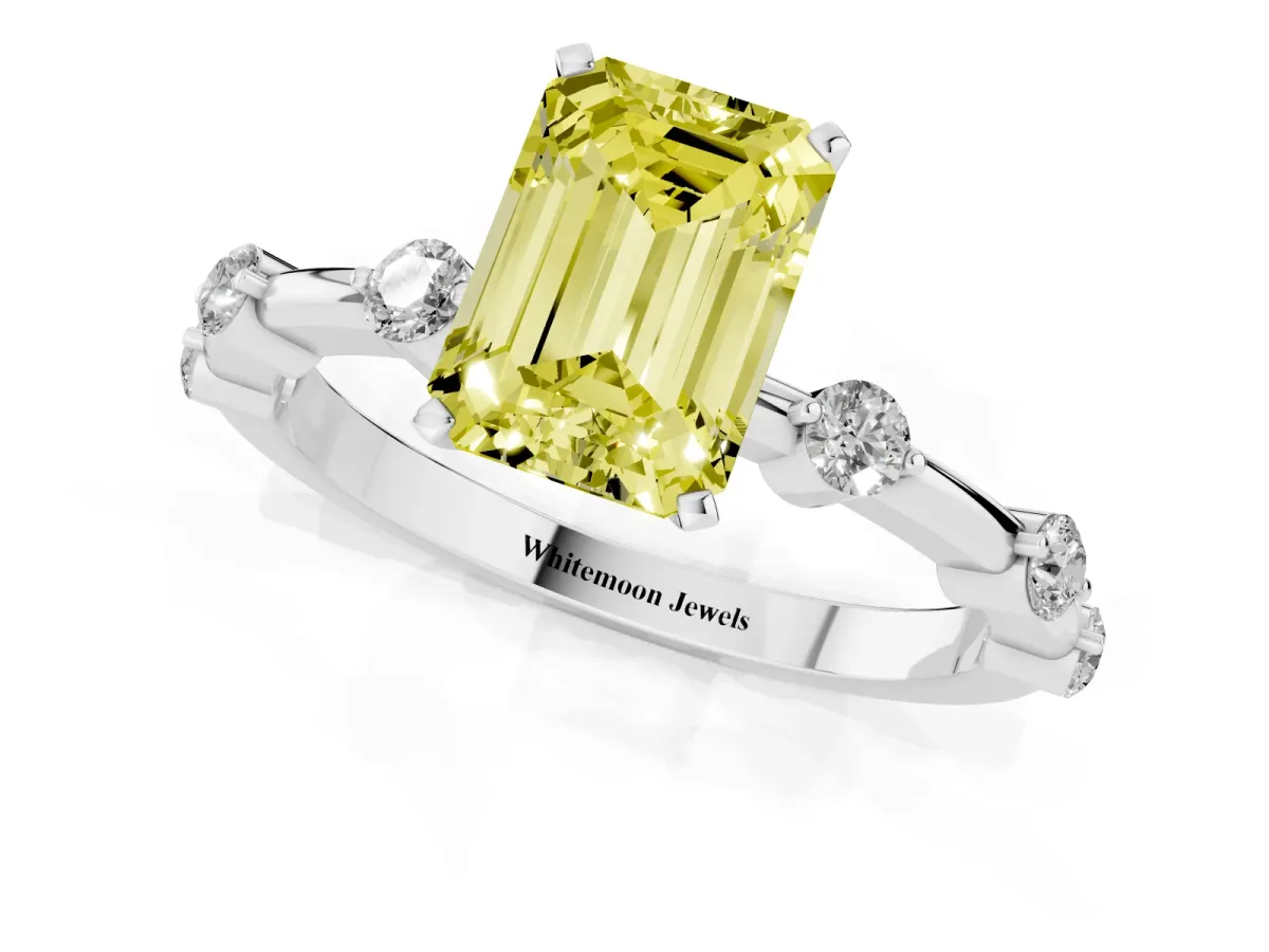 Fancy Yellow Emerald Cut Solitaire Diamond Ring with Bezel Set Side Stones and Prong Setting Silver