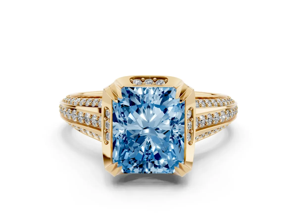 Fancy Blue Radiant Cut Solitaire Pave Split Shank Ring with Four-Prong Setting Yellow gold