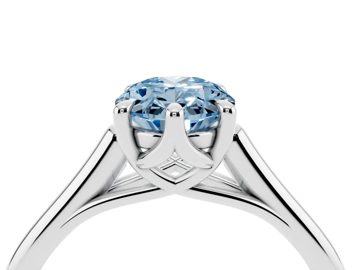 Fancy Blue Oval Cut Solitaire Engagement Ring with Six-Prong Setting and Classic Band Silver