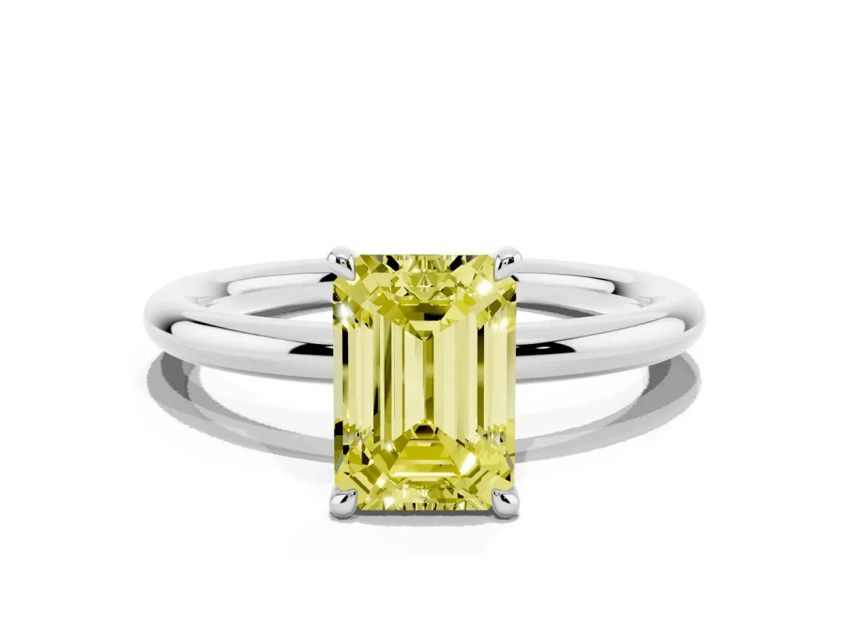 Fancy Yellow Emerald Cut Diamond Solitaire Ring with Thin Band and Four-Prong Setting Silver