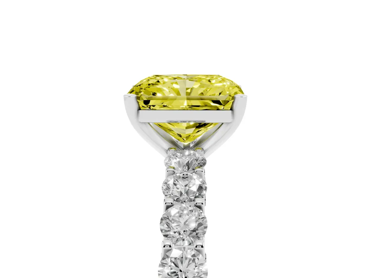 Fancy Yellow Radiant Cut Diamond Solitaire Ring with Shared Prong Pavé Band and Four-Prong Setting Platinum