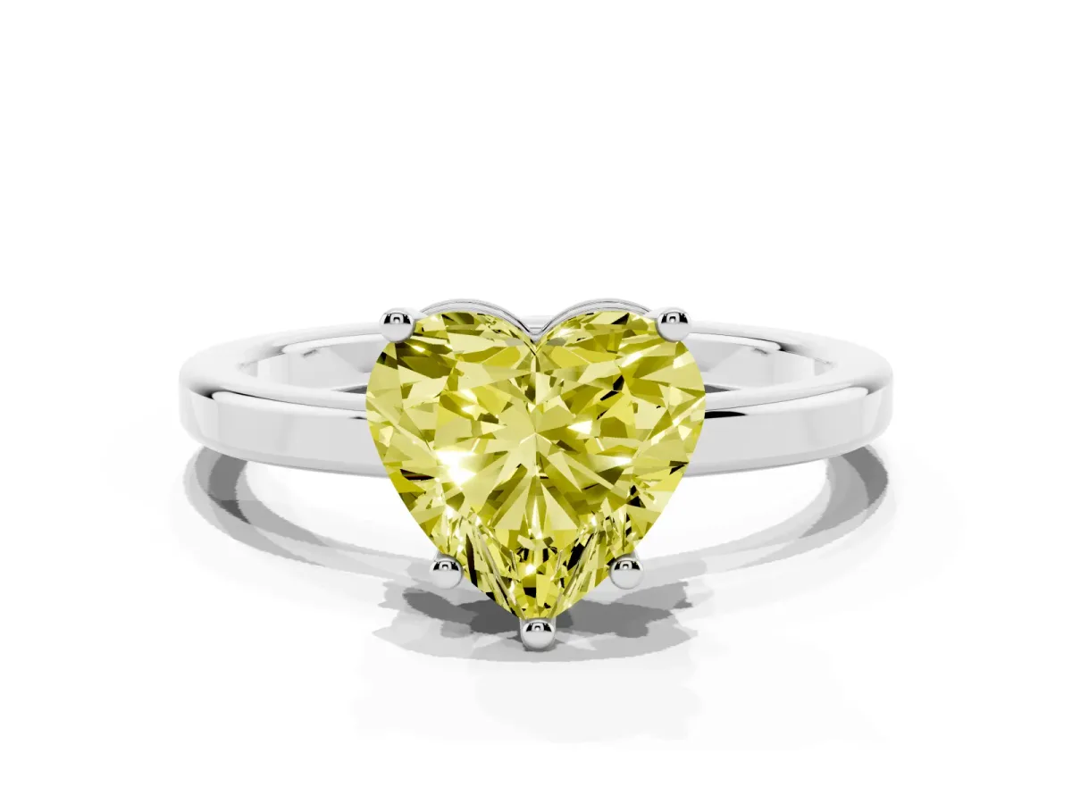 Fancy Yellow Heart Cut Cut Solitaire Engagement Ring with Four-Prong Setting on a Classic Band Silver