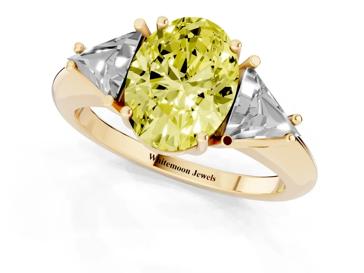 Fancy Yellow Three-Stone Oval Cut Diamond Engagement Ring with Trillion Side Stones and Prong Setting Yellow gold