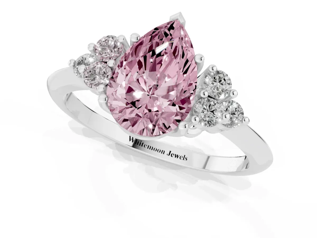 Fancy Pink Pear Cut Cut Diamond Cluster Ring with Solitaire Band and Four-Prong Setting Silver