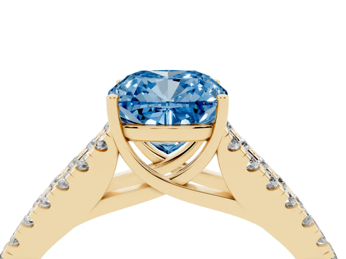 Fancy Blue Cushion Cut Diamond Split Shank Pavé Engagement Ring with Four-Prong Setting Yellow gold