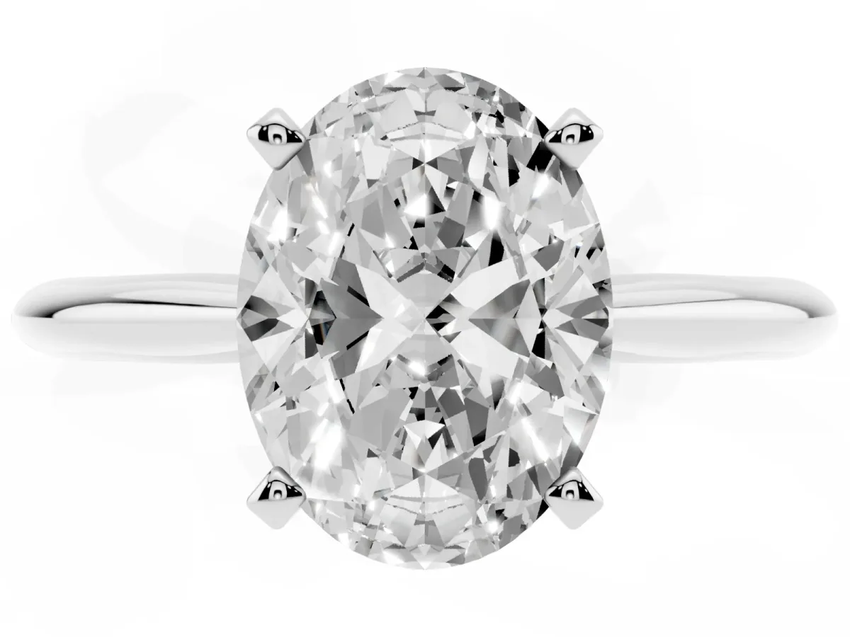 Oval Cut Cut Solitaire Ring with Four-Prong Setting on a Classic Band Platinum