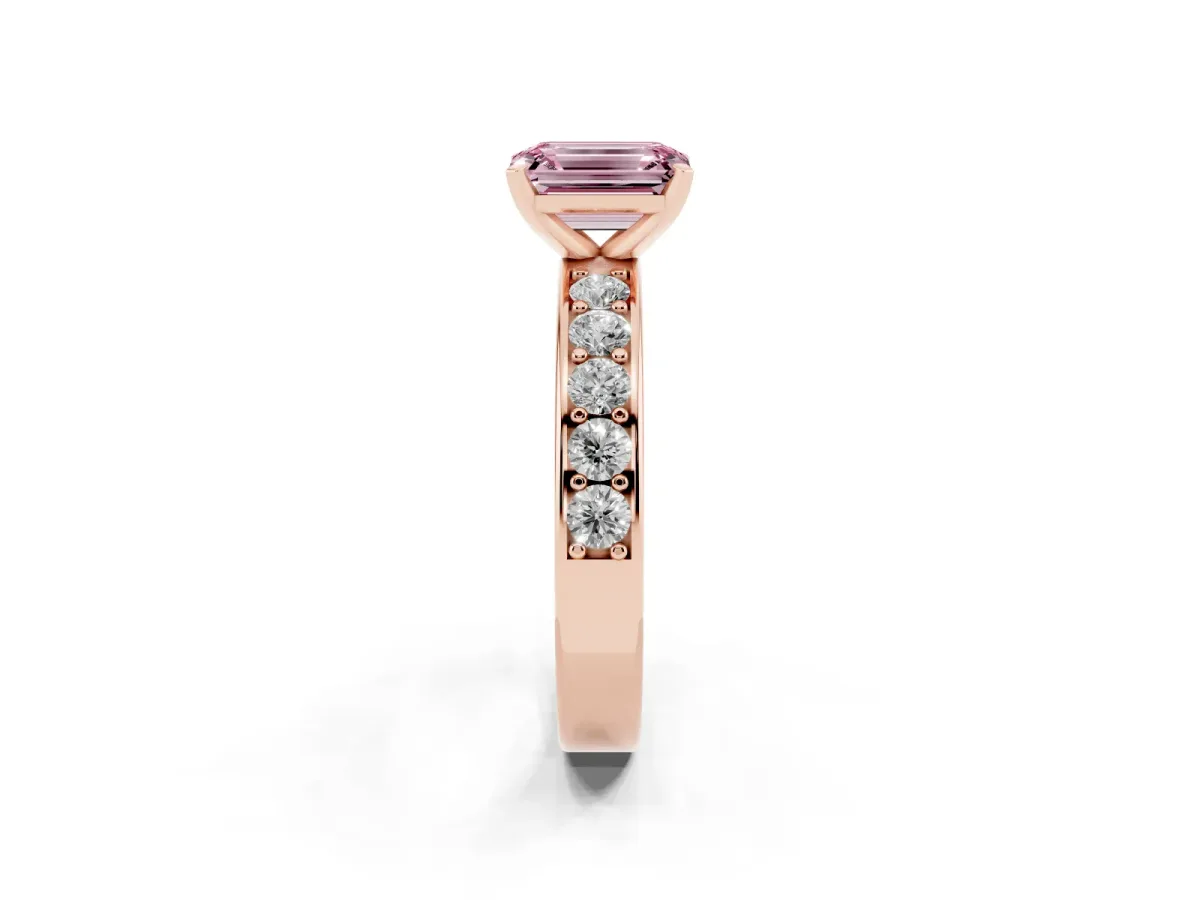 Fancy Pink Emerald Cut Diamond Engagement Ring with Channel Set Round Band and Prong Setting Rose gold