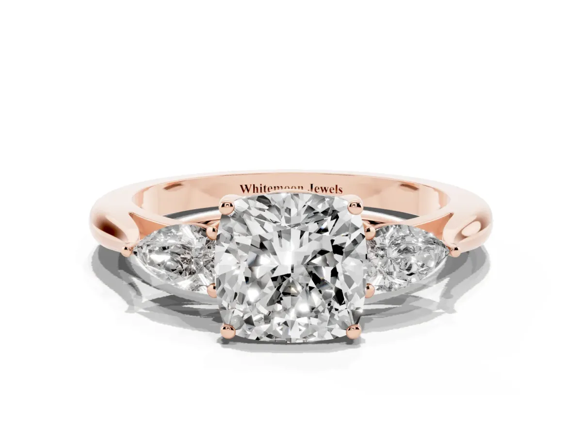 Cushion Cut Diamond Three-Stone Ring with Pear Side Stones and Prong Setting Rose gold