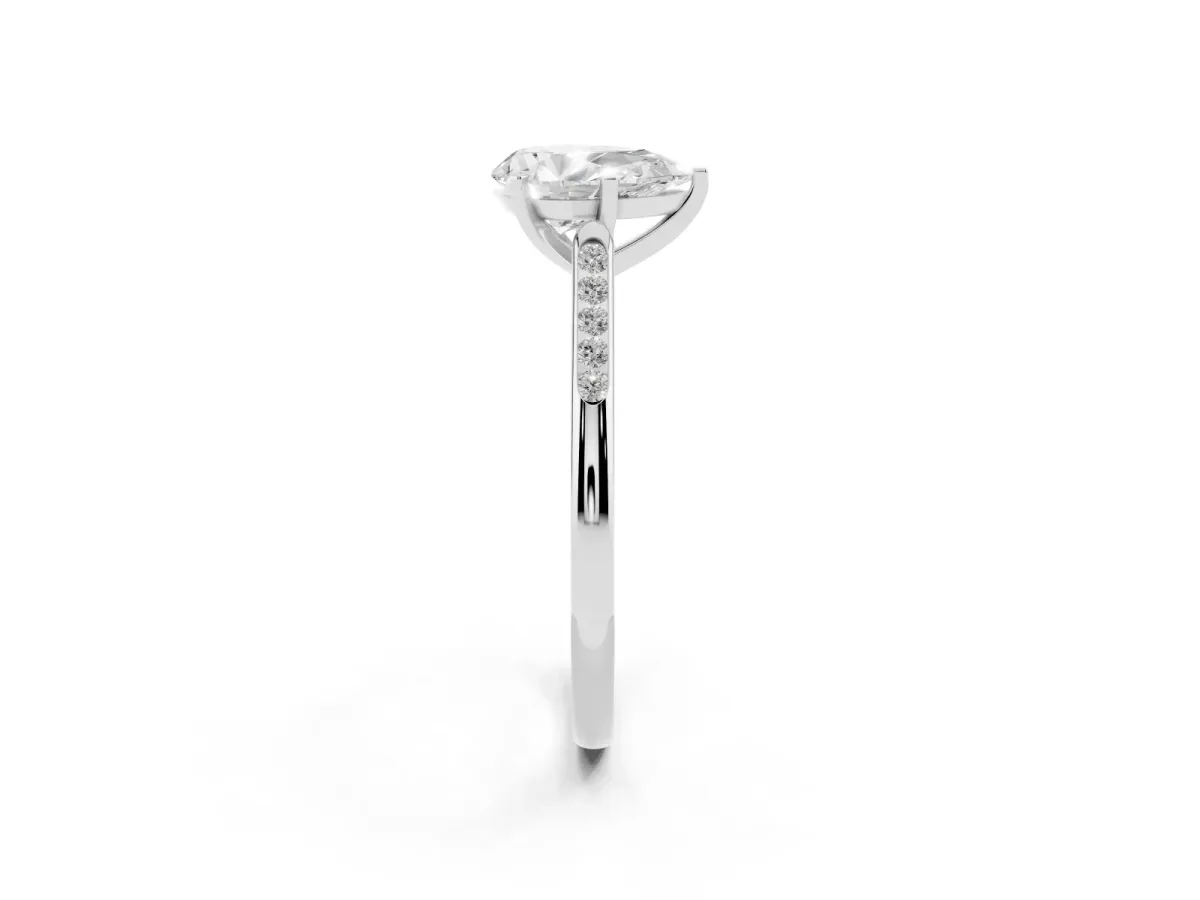 Pear Cut Diamond Solitaire Ring with Channel Set Round Band and Prong Setting Silver