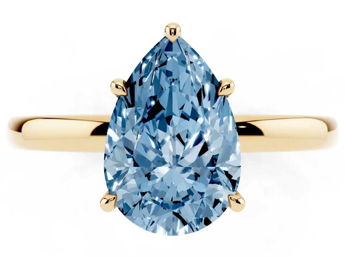Fancy Blue Pear Cut Solitaire Engagement Ring with Cathedral Band and Four-Prong Setting Yellow gold