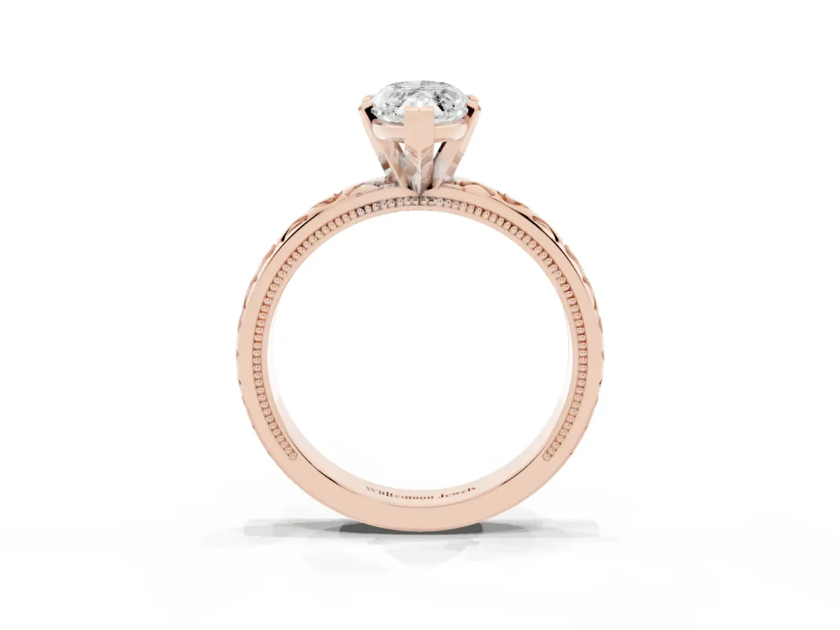 Marquise Cut Solitaire Diamond Engagement Ring with XO Engraved Band and Four-Prong Setting Rose gold