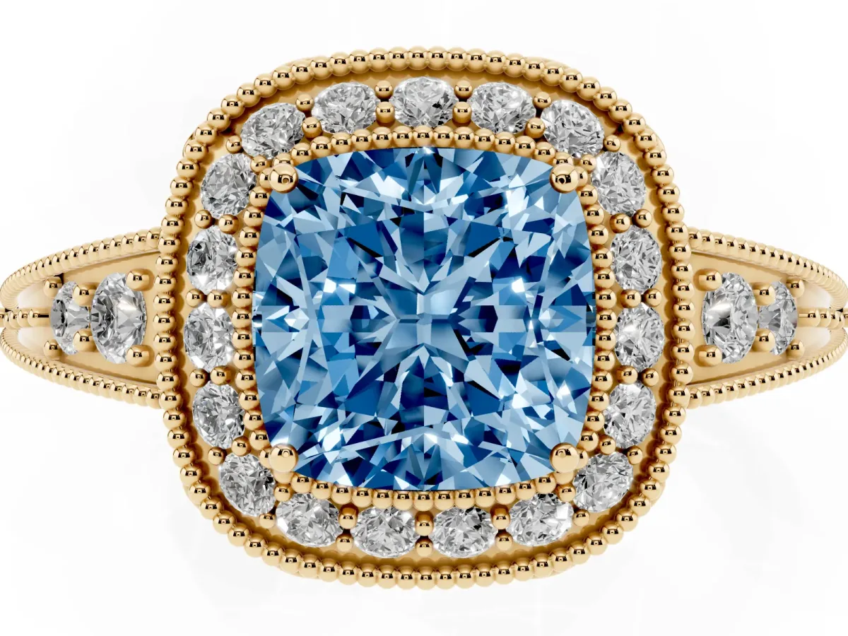 Fancy Blue Cushion Cut Halo Diamond Split Shank Ring with Milgrain Detail Yellow gold
