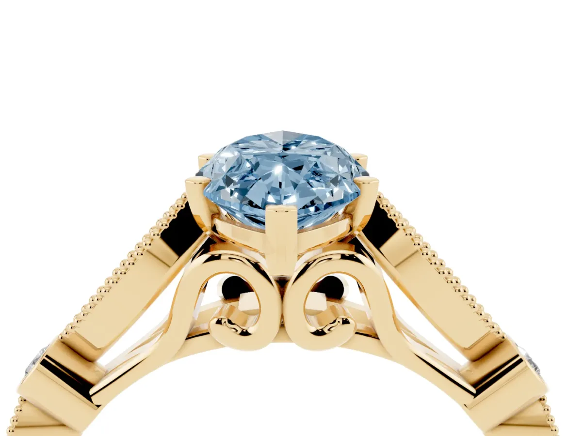 Fancy Blue Marquise Cut Cut Diamond with Milgrain Marquise and Bezel Accents on a Solitaire Band with Prong Setting Yellow gold