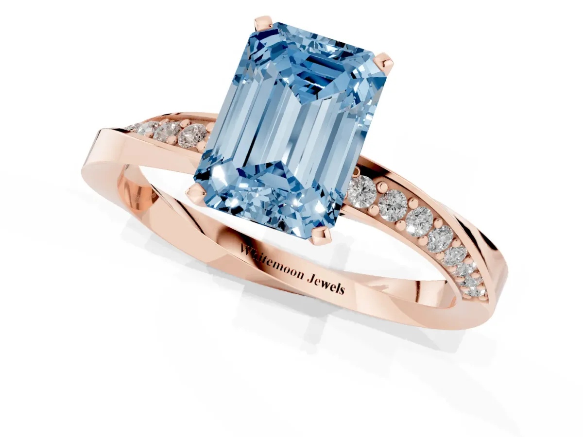 Fancy Blue Emerald Cut Diamond Engagement Ring with Side Stone Accents and Four-Prong Setting Rose gold