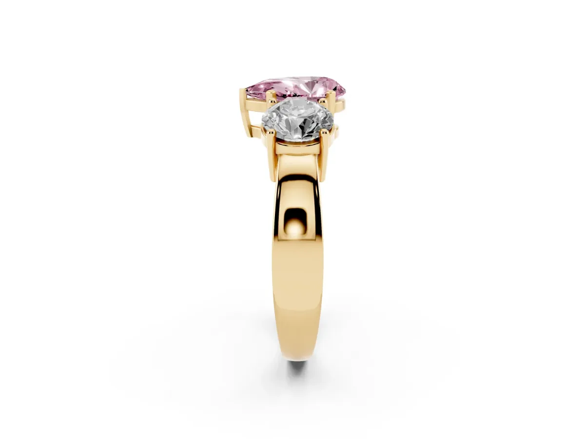 Fancy Pink Three-Stone Pear Cut Diamond Ring with Round Side Stones, Classic Band, and Four-Prong Setting Yellow gold