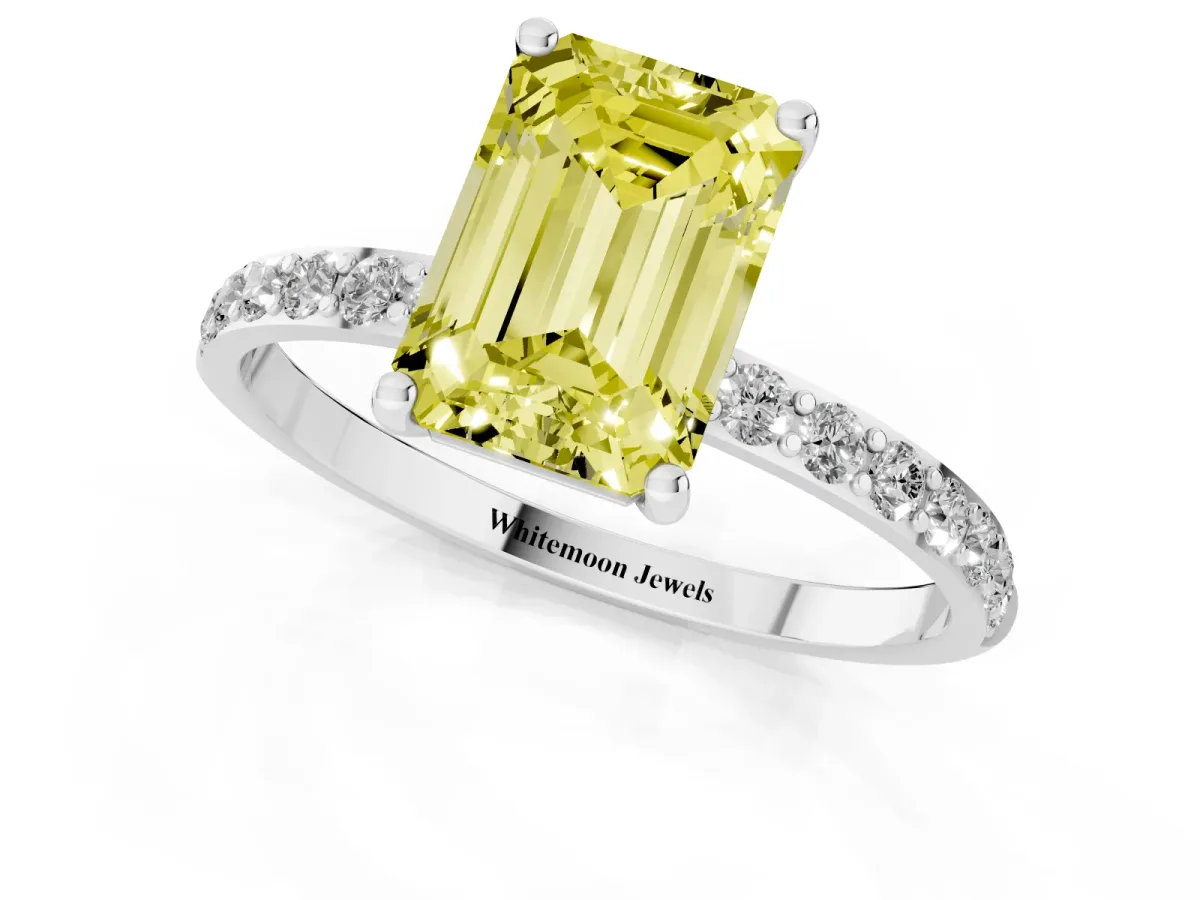 Fancy Yellow Emerald Cut Diamond Solitaire Ring with Round Pavé Shoulders and Prong Setting Platinum