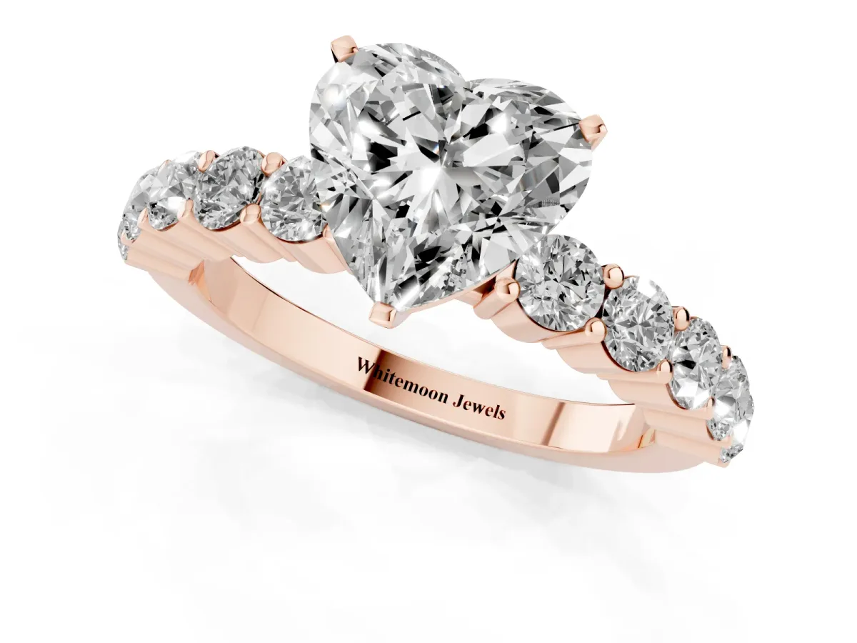 Heart Cut Diamond Solitaire Ring with Shared Prong Round Side Stones Rose gold