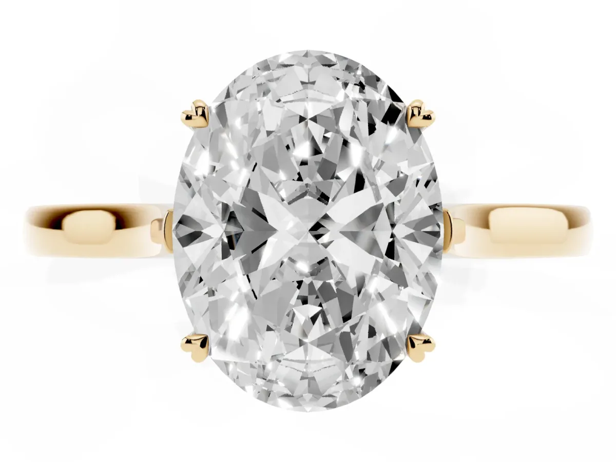 Oval Cut Solitaire Heart Prong Engagement Ring with Tapered Band Yellow gold