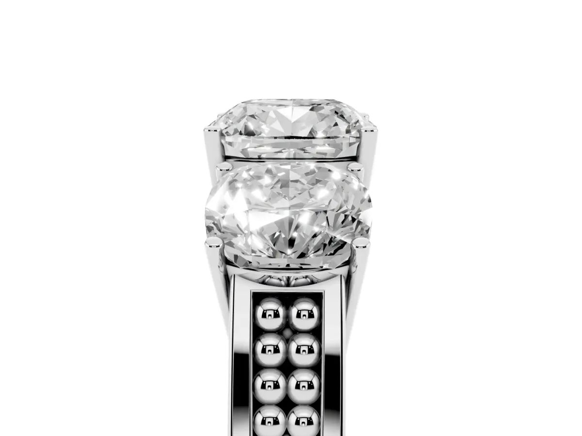 Cushion Cut Diamond Three-Stone Ring with Prong Setting and Textured Band Platinum
