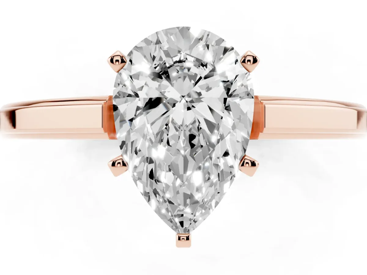 Pear Cut Solitaire Diamond Ring with Four-Prong Setting and Classic Band Rose gold