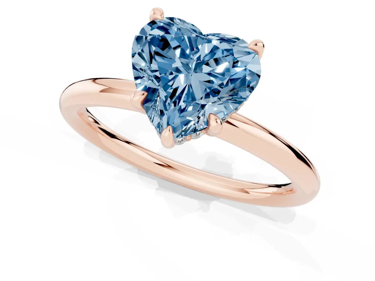Fancy Blue Heart Cut Diamond Solitaire Ring with Thin Band and Four-Prong Setting Rose gold