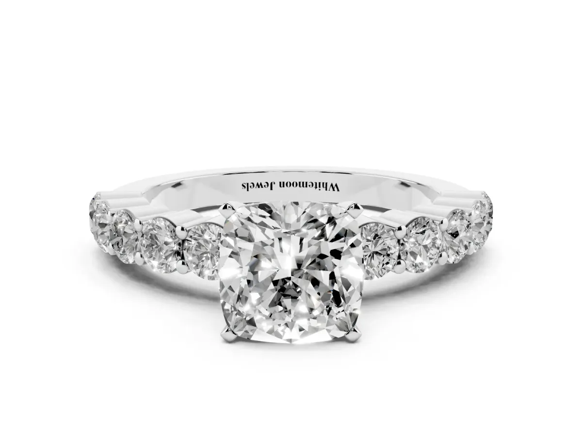 Cushion Cut Diamond Solitaire Ring with Shared Prong Round Side Stones Platinum