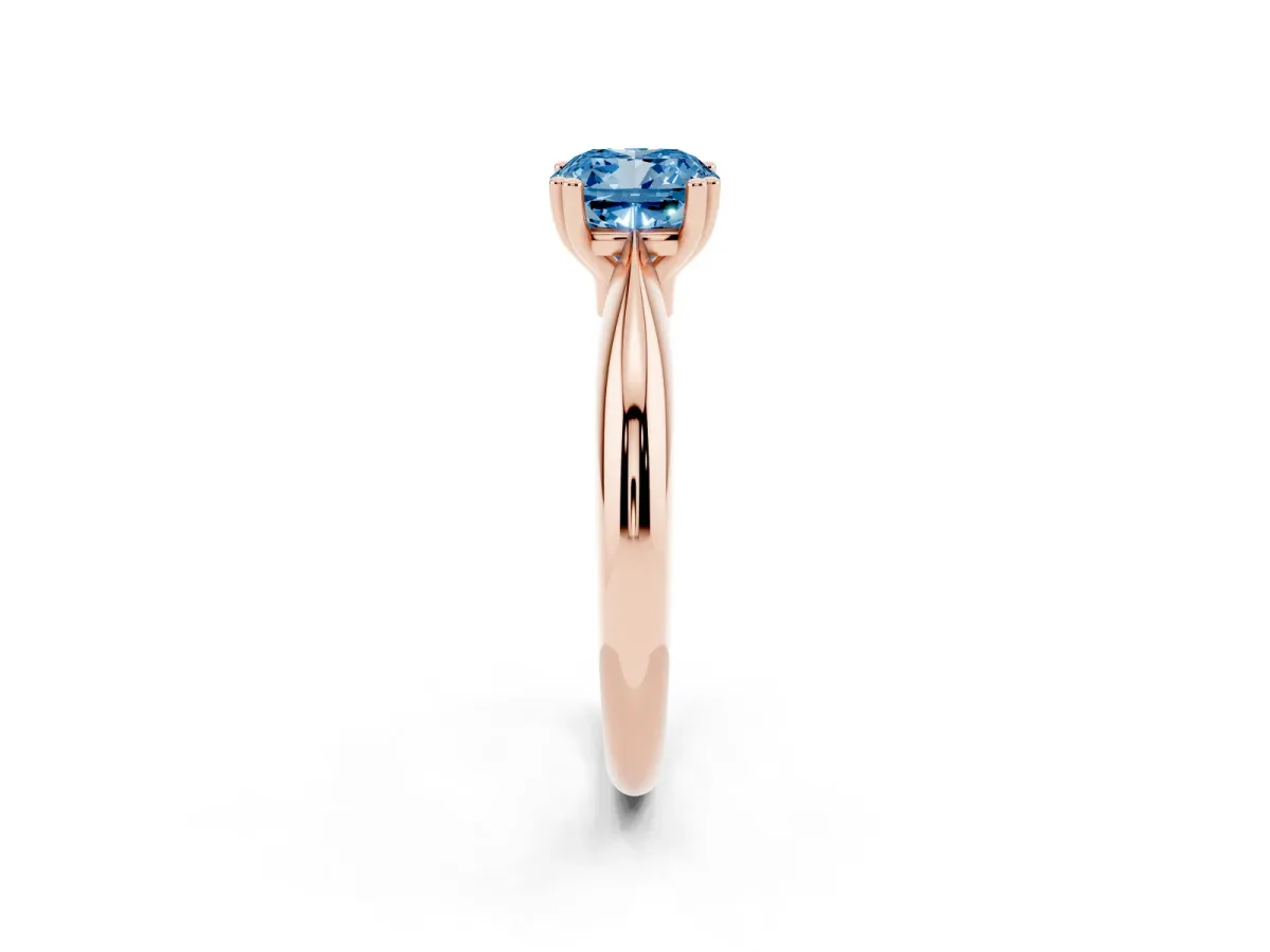 Fancy Blue Cushion Cut Cut Solitaire Engagement Ring with Tapered Band and Four-Prong Setting Rose gold