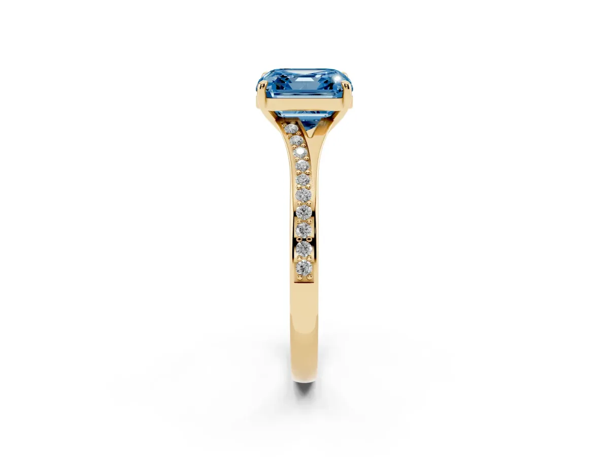 Fancy Blue Asscher Cut Diamond Solitaire Ring with Pavé Band and Prong Setting Yellow gold