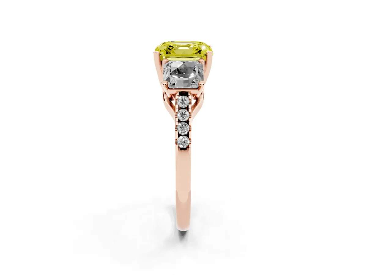 Fancy Yellow Three-Stone Asscher Cut Diamond Ring with Round Pavé Band and Prong Setting Rose gold