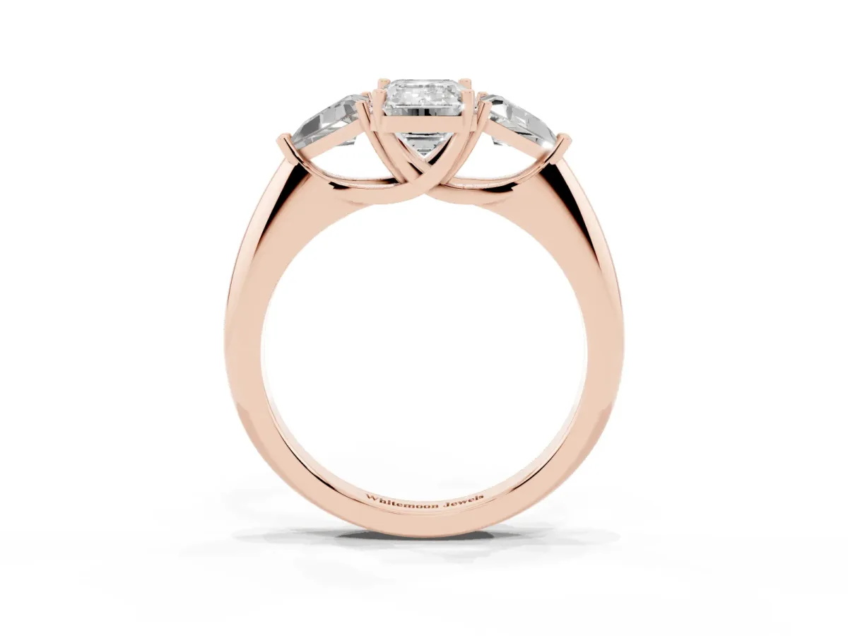 Three-Stone Emerald Cut Diamond Engagement Ring with Trillion Side Stones and Prong Setting Rose gold