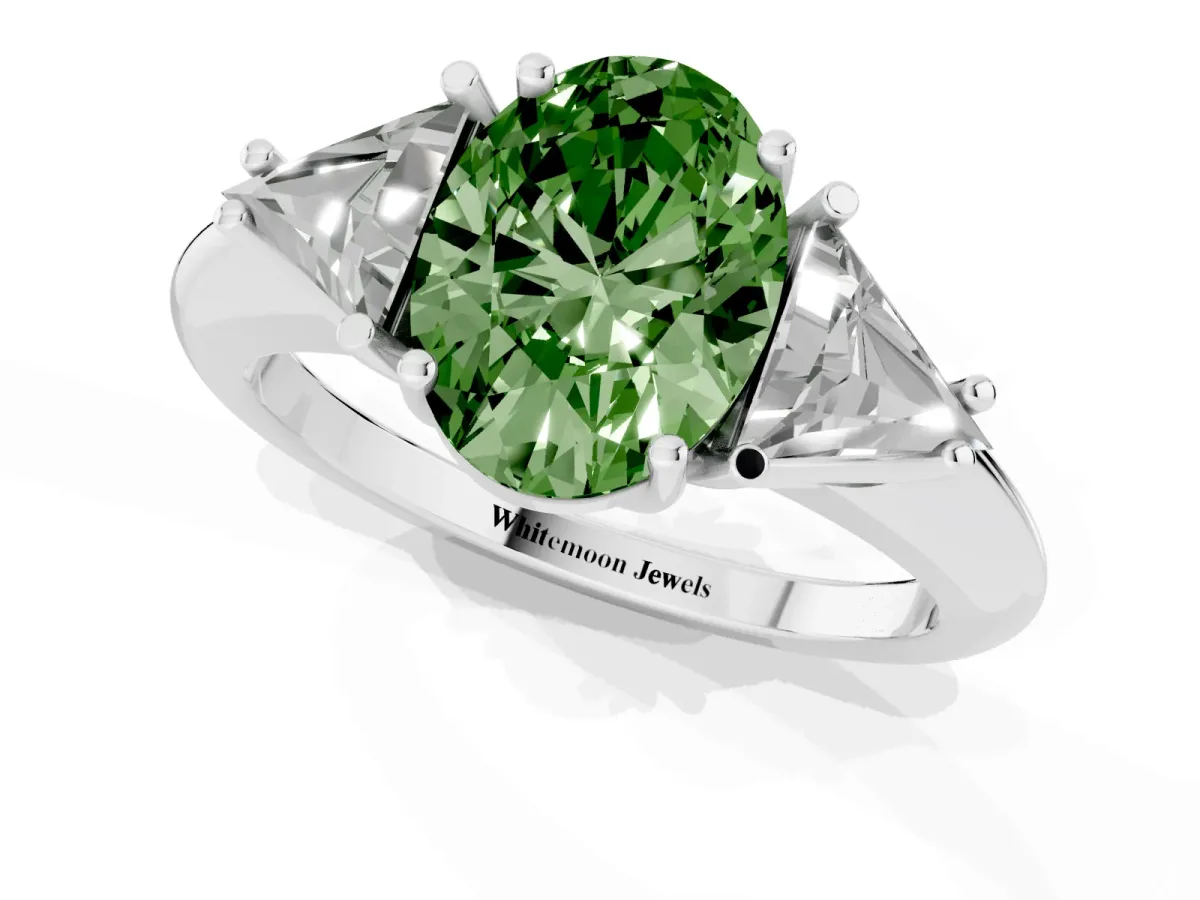 Fancy Green Three-Stone Oval Cut Diamond Engagement Ring with Trillion Side Stones and Prong Setting Silver