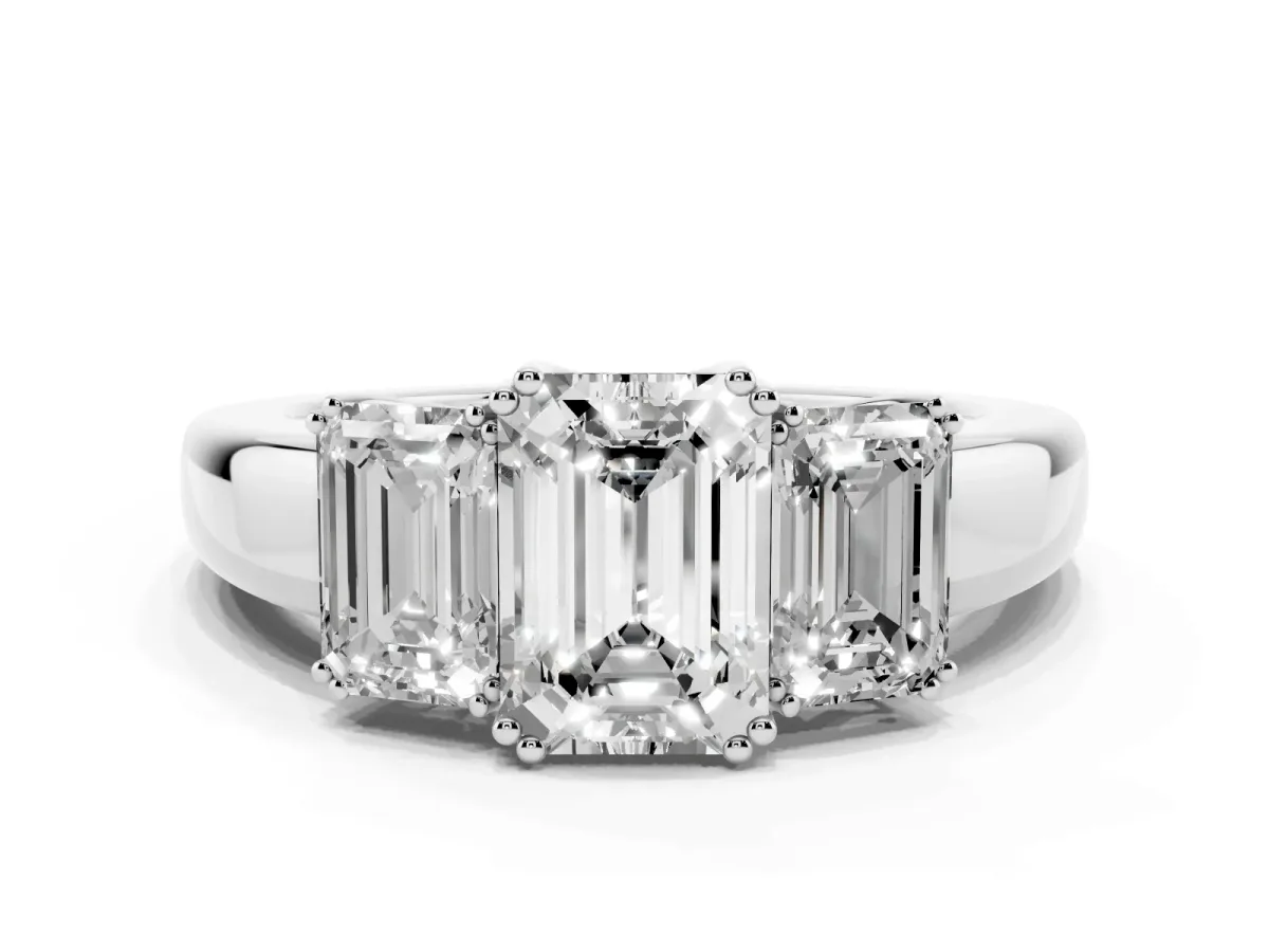 Three-Stone Emerald Cut Cut Diamond Ring with Channel Set Band and Four-Prong Setting Platinum