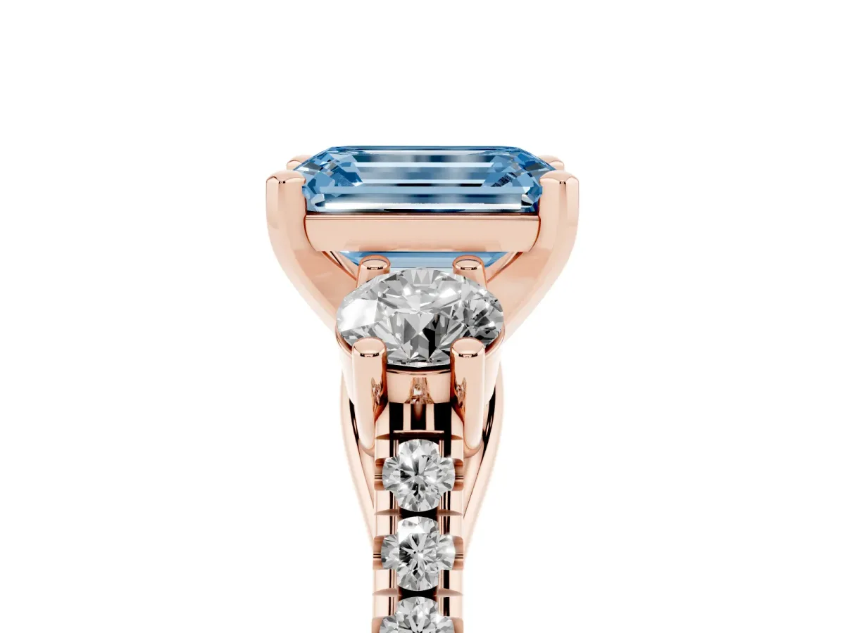 Fancy Blue Three-Stone Emerald Cut Diamond Pavé Band with Four-Prong Setting Rose gold