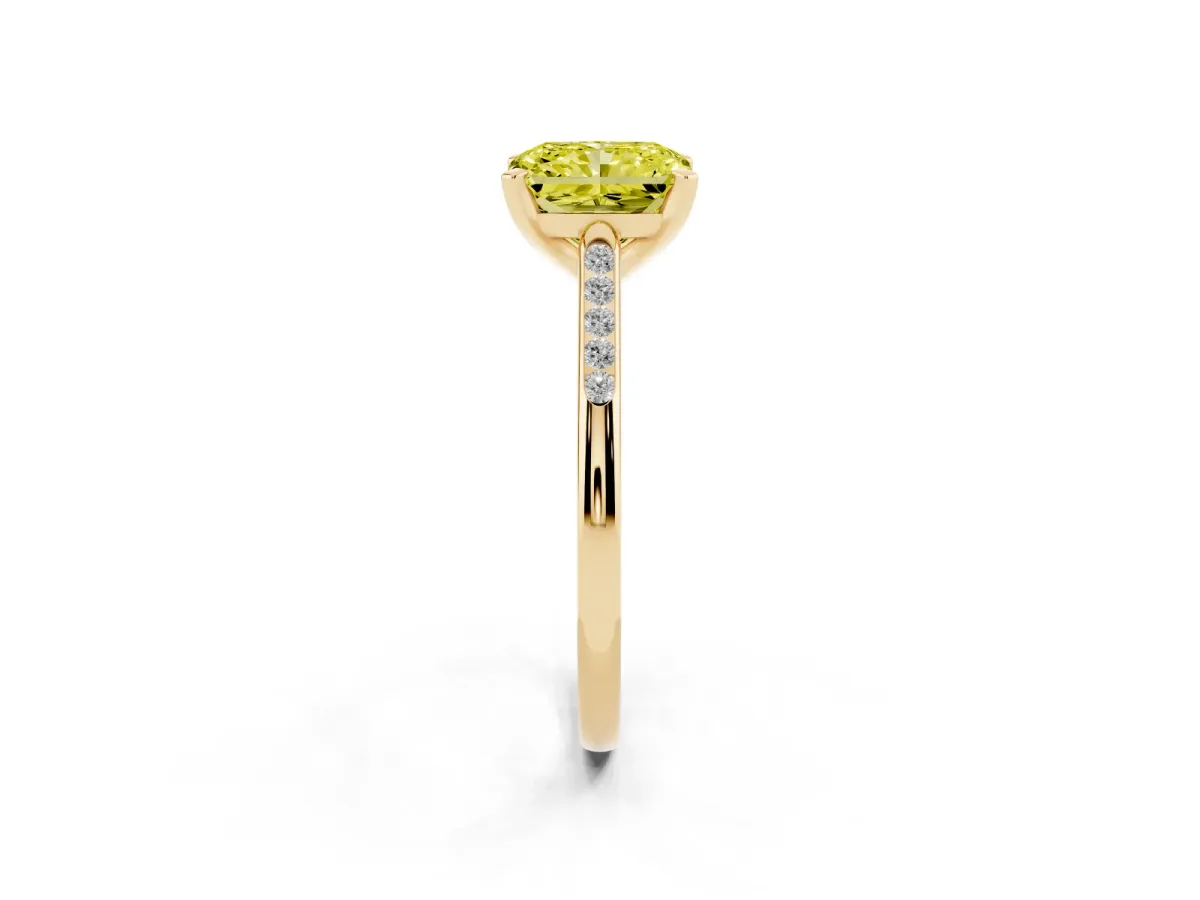 Fancy Yellow Radiant Cut Diamond Solitaire Ring with Channel Set Round Band and Prong Setting Yellow gold