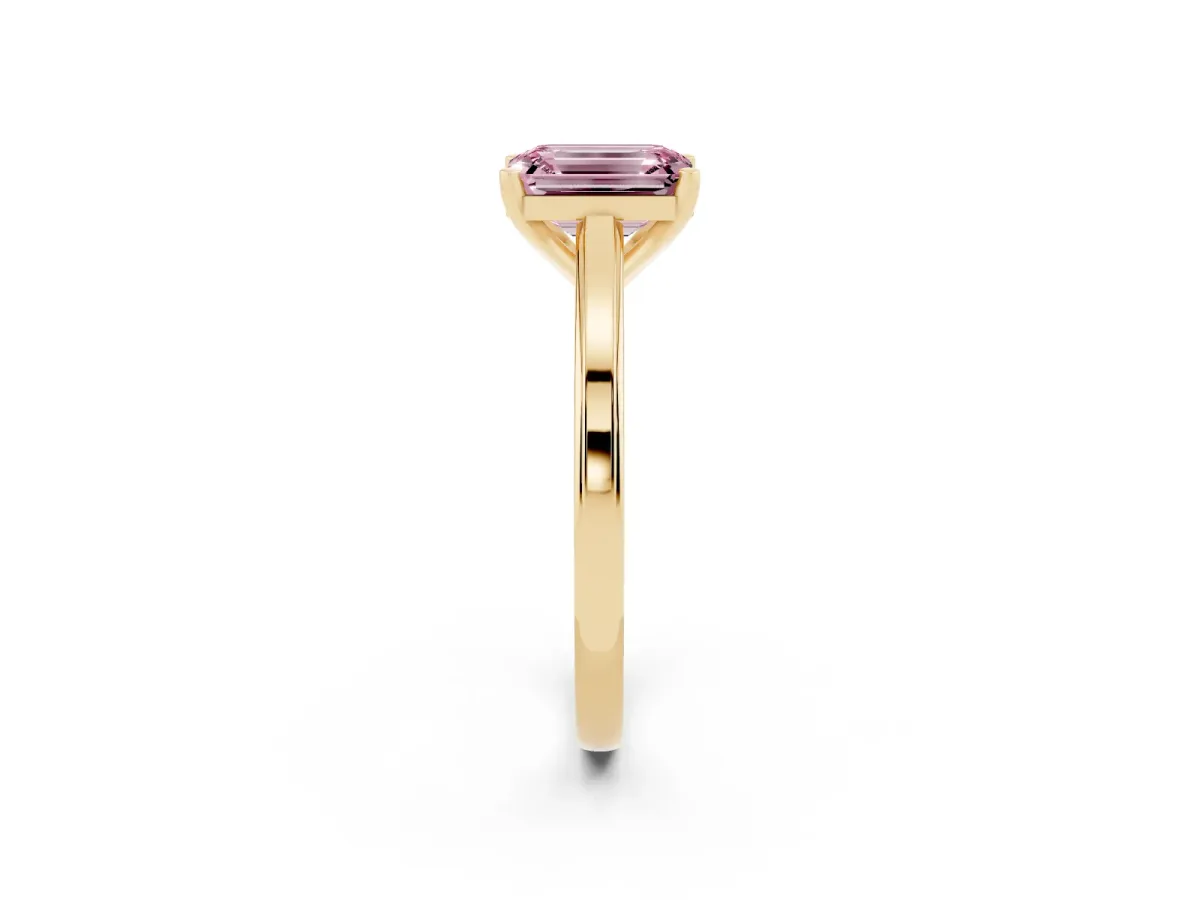Fancy Pink Emerald Cut Solitaire Diamond Ring with Four-Prong Setting and Classic Band Yellow gold
