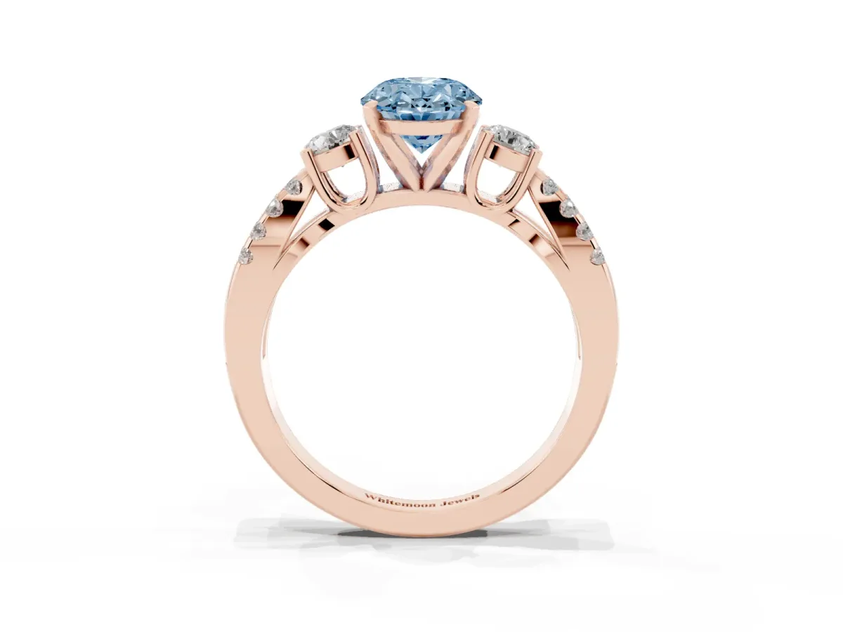 Fancy Blue Oval Cut Diamond Three-Stone Ring with Pavé Split Shank and Four-Prong Setting Rose gold