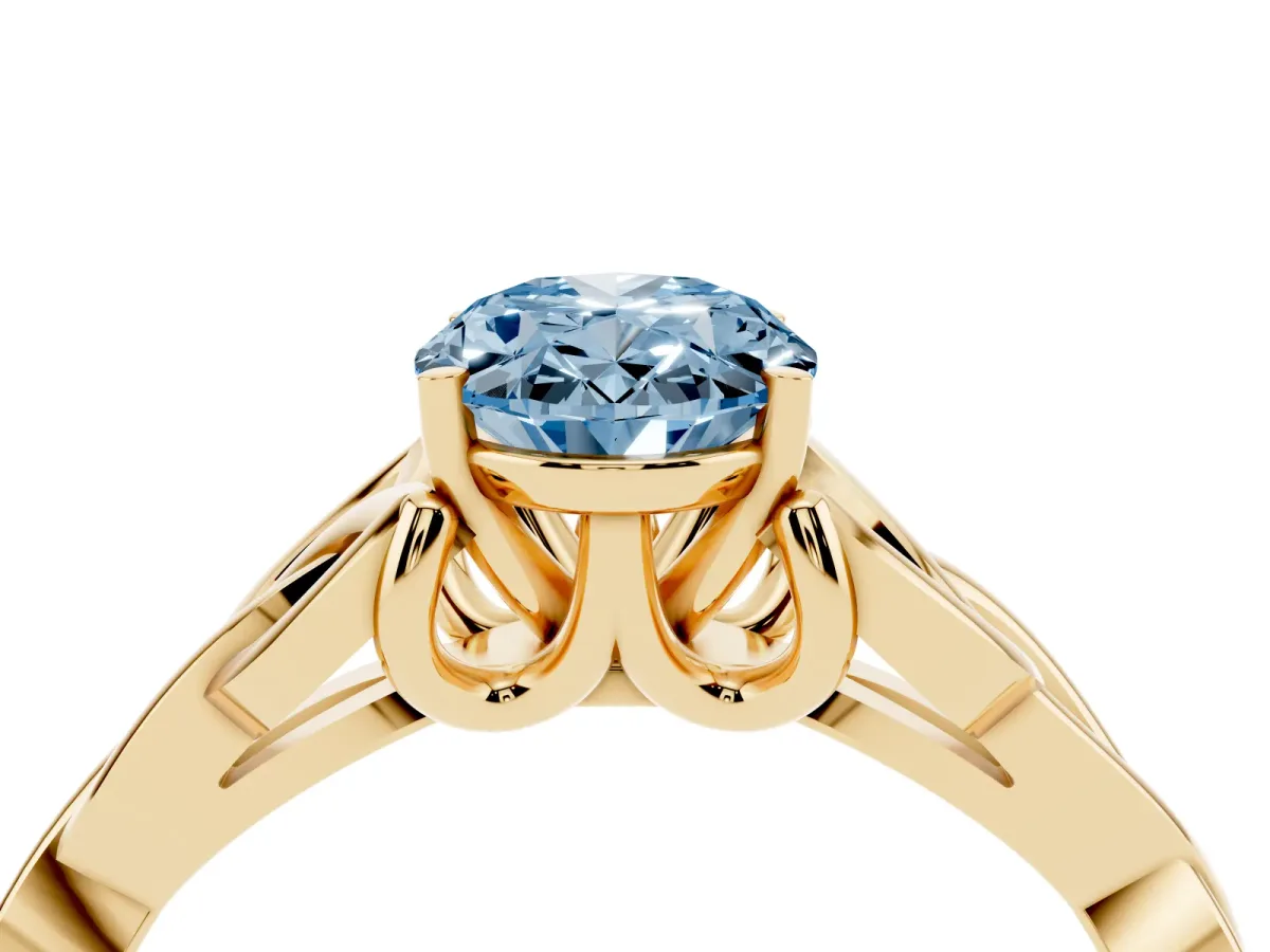Fancy Blue Oval Cut Diamond Solitaire Engagement Ring with Celtic Knot Band and Four-Prong Setting Yellow gold