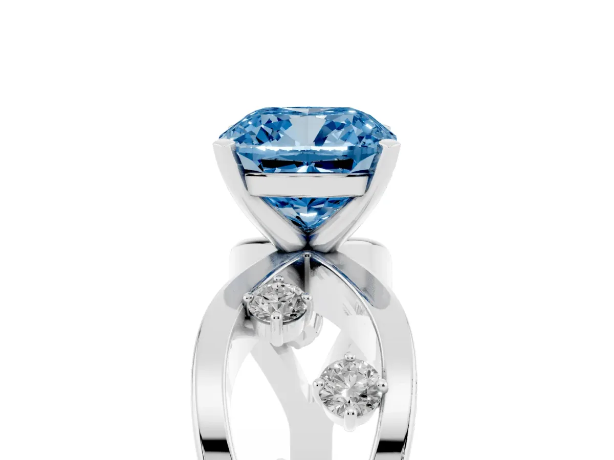 Fancy Blue Cushion Cut Cut Solitaire Diamond with Side Stones on Criss-Cross Band and Four-Prong Setting Silver