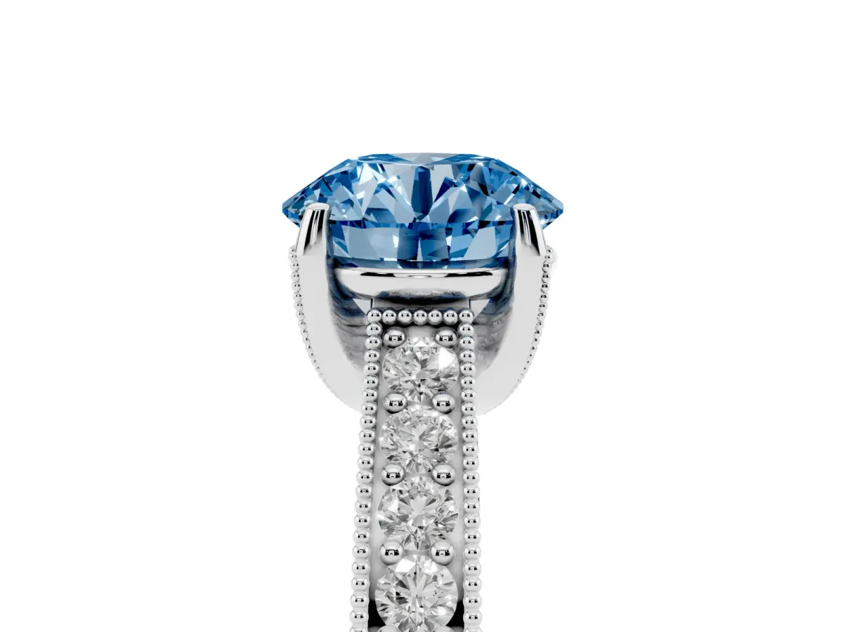 Fancy Blue Round Cut Cut Diamond Solitaire Ring with Milgrain Pave Band and Four Prong Setting Silver